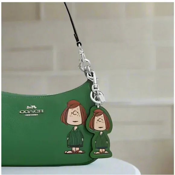 Coach x Peanuts Peppermint Patty Leather Bag Charm Keychain CBG57 Green 2025 - Picture 2 of 9